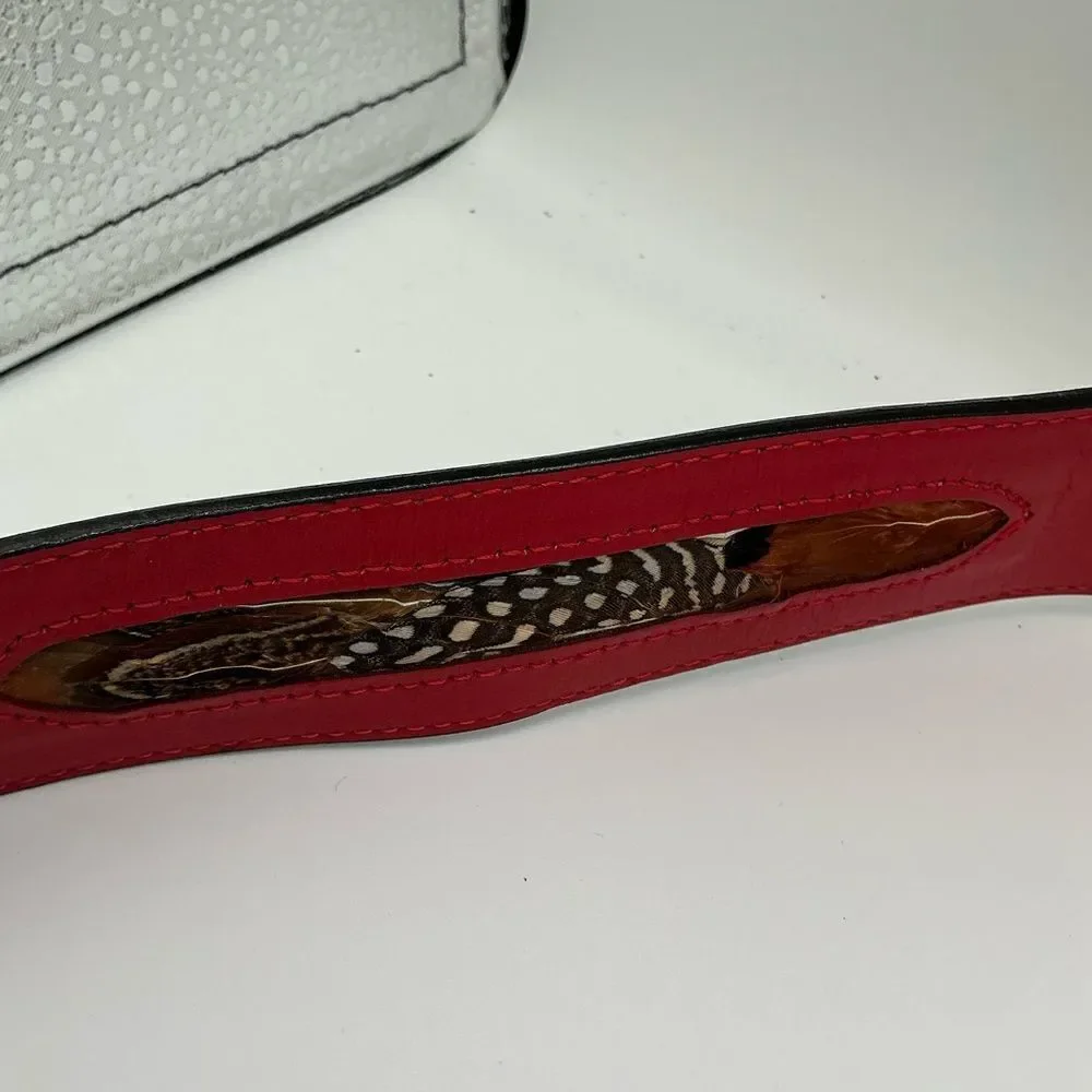 Red Rondina leather belt with feather inlays